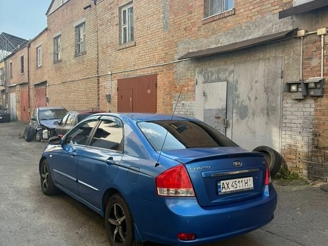 Синий Киа Черато, объемом двигателя 1.98 л и пробегом 224 тыс. км за 4500 $, фото 15 на Automoto.ua