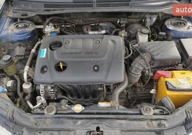 Синий Киа Черато, объемом двигателя 1.59 л и пробегом 253 тыс. км за 4700 $, фото 1 на Automoto.ua