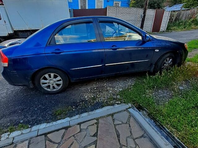 Синий Киа Черато, объемом двигателя 1.6 л и пробегом 269 тыс. км за 3700 $, фото 4 на Automoto.ua