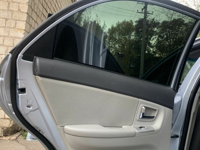 Синій Кіа Черато, об'ємом двигуна 2 л та пробігом 199 тис. км за 5299 $, фото 6 на Automoto.ua