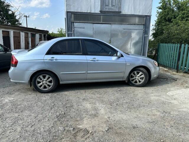Синий Киа Черато, объемом двигателя 1.6 л и пробегом 270 тыс. км за 3500 $, фото 11 на Automoto.ua