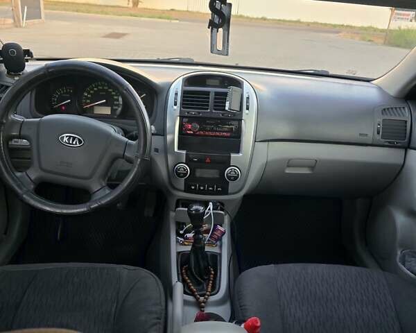 Синій Кіа Черато, об'ємом двигуна 1.59 л та пробігом 200 тис. км за 3800 $, фото 5 на Automoto.ua