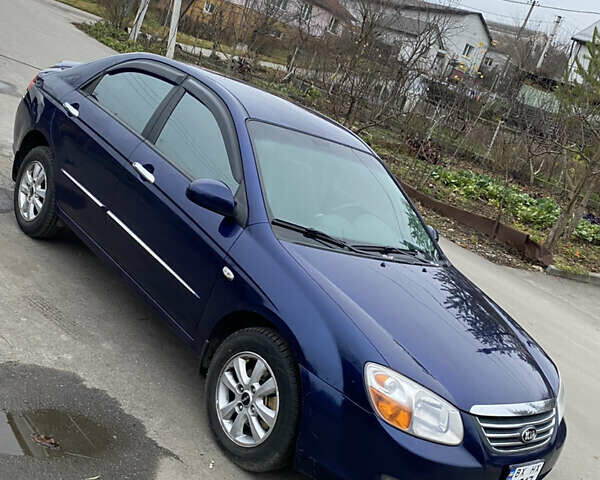 Синій Кіа Черато, об'ємом двигуна 1.59 л та пробігом 303 тис. км за 4400 $, фото 4 на Automoto.ua