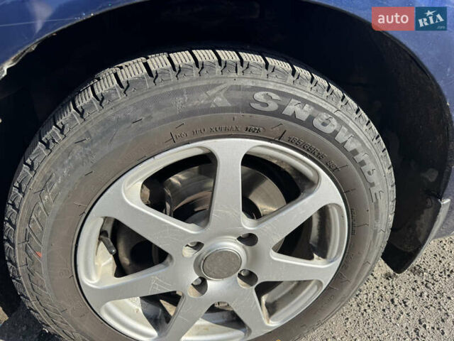 Синий Киа Черато, объемом двигателя 1.59 л и пробегом 250 тыс. км за 3100 $, фото 8 на Automoto.ua