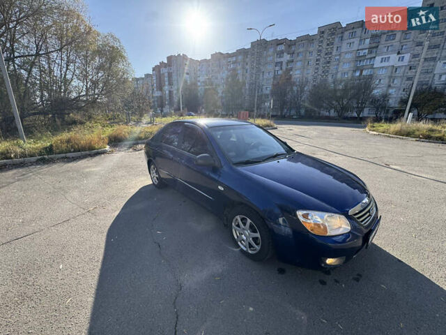 Синий Киа Черато, объемом двигателя 1.59 л и пробегом 250 тыс. км за 3100 $, фото 26 на Automoto.ua