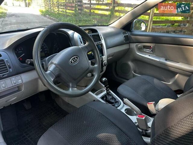 Синій Кіа Черато, об'ємом двигуна 1.6 л та пробігом 248 тис. км за 5990 $, фото 9 на Automoto.ua