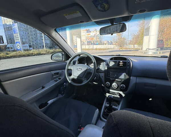 Синий Киа Черато, объемом двигателя 1.59 л и пробегом 250 тыс. км за 3100 $, фото 29 на Automoto.ua