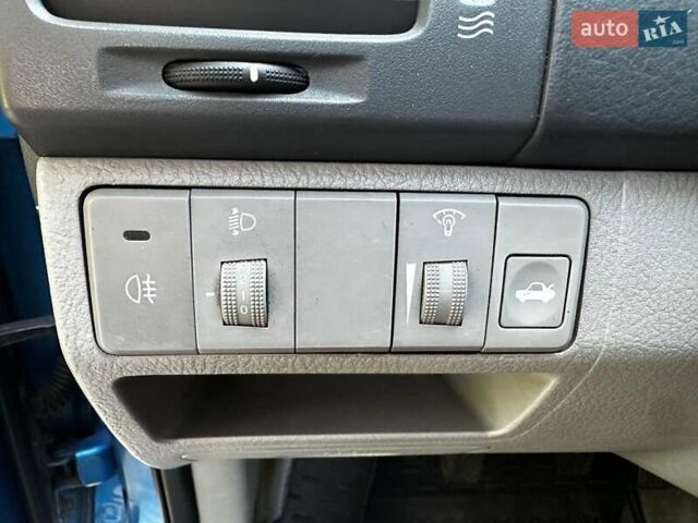 Синій Кіа Черато, об'ємом двигуна 1.6 л та пробігом 248 тис. км за 5990 $, фото 10 на Automoto.ua