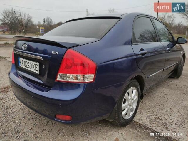 Синий Киа Черато, объемом двигателя 1.98 л и пробегом 246 тыс. км за 4400 $, фото 9 на Automoto.ua