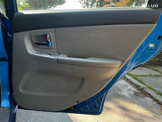 Синий Киа Черато, объемом двигателя 1.6 л и пробегом 248 тыс. км за 5990 $, фото 18 на Automoto.ua