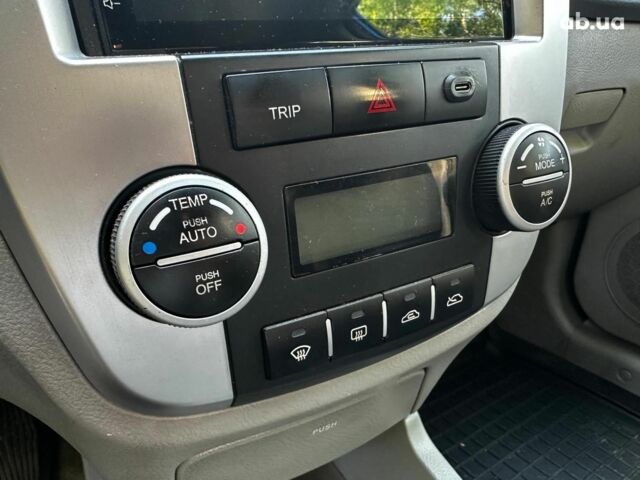 Синий Киа Черато, объемом двигателя 1.6 л и пробегом 248 тыс. км за 5990 $, фото 13 на Automoto.ua