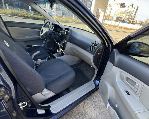 Синий Киа Черато, объемом двигателя 1.59 л и пробегом 250 тыс. км за 3100 $, фото 32 на Automoto.ua