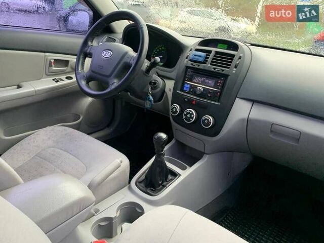 Синій Кіа Черато, об'ємом двигуна 1.6 л та пробігом 255 тис. км за 4600 $, фото 5 на Automoto.ua