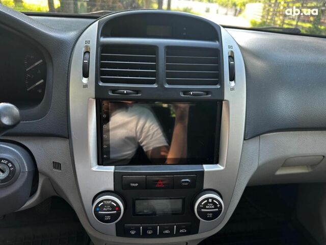 Синий Киа Черато, объемом двигателя 1.6 л и пробегом 248 тыс. км за 5990 $, фото 12 на Automoto.ua