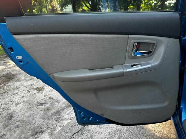 Синий Киа Черато, объемом двигателя 1.6 л и пробегом 248 тыс. км за 5240 $, фото 16 на Automoto.ua