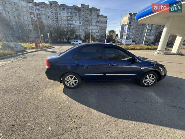 Синий Киа Черато, объемом двигателя 1.59 л и пробегом 250 тыс. км за 3100 $, фото 24 на Automoto.ua