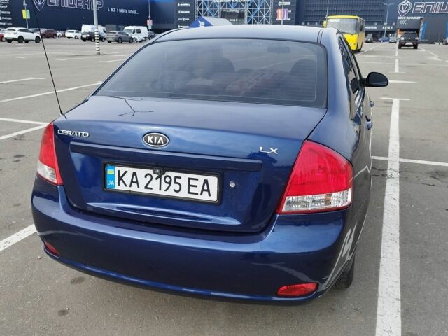 Синий Киа Черато, объемом двигателя 2 л и пробегом 253 тыс. км за 4900 $, фото 2 на Automoto.ua