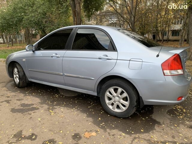 Синій Кіа Черато, об'ємом двигуна 2 л та пробігом 199 тис. км за 5299 $, фото 5 на Automoto.ua