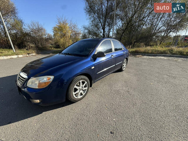 Синий Киа Черато, объемом двигателя 1.59 л и пробегом 250 тыс. км за 3100 $, фото 5 на Automoto.ua