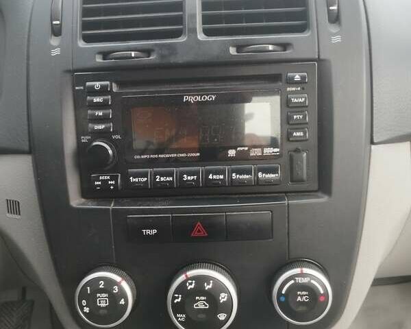 Синий Киа Черато, объемом двигателя 1.6 л и пробегом 297 тыс. км за 3900 $, фото 16 на Automoto.ua