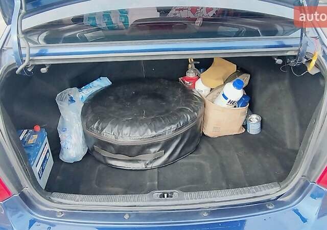 Синий Киа Черато, объемом двигателя 1.59 л и пробегом 253 тыс. км за 4700 $, фото 7 на Automoto.ua