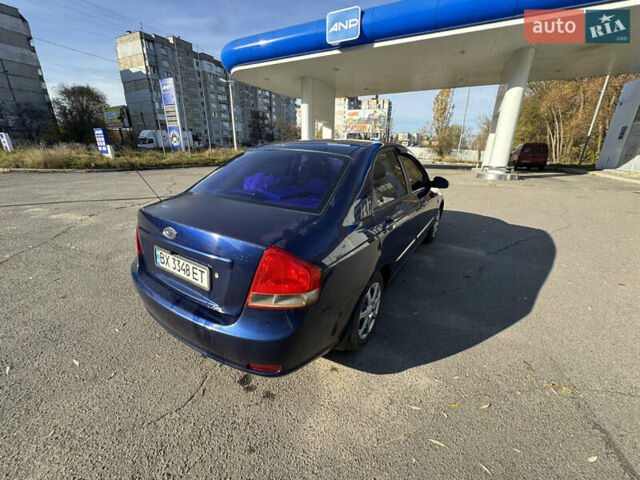 Синий Киа Черато, объемом двигателя 1.59 л и пробегом 250 тыс. км за 3100 $, фото 22 на Automoto.ua