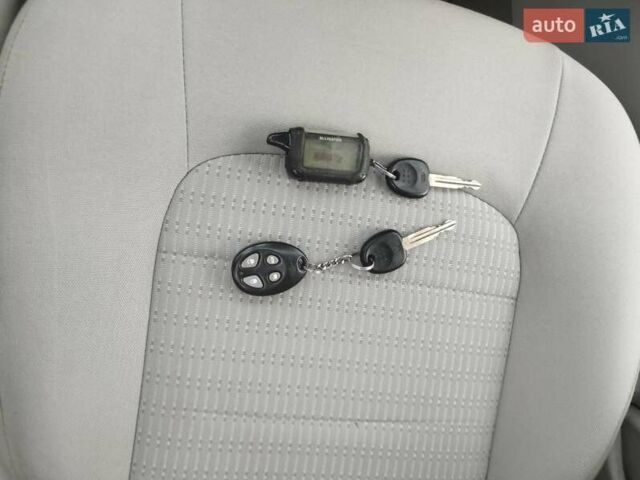 Синий Киа Черато, объемом двигателя 1.6 л и пробегом 297 тыс. км за 3900 $, фото 12 на Automoto.ua