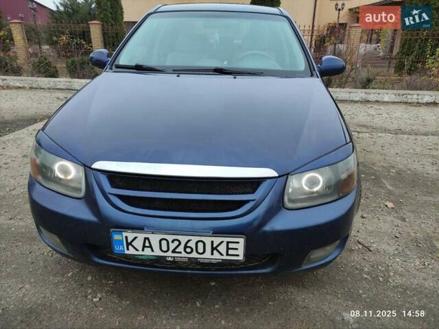 Синий Киа Черато, объемом двигателя 1.98 л и пробегом 246 тыс. км за 4400 $, фото 2 на Automoto.ua