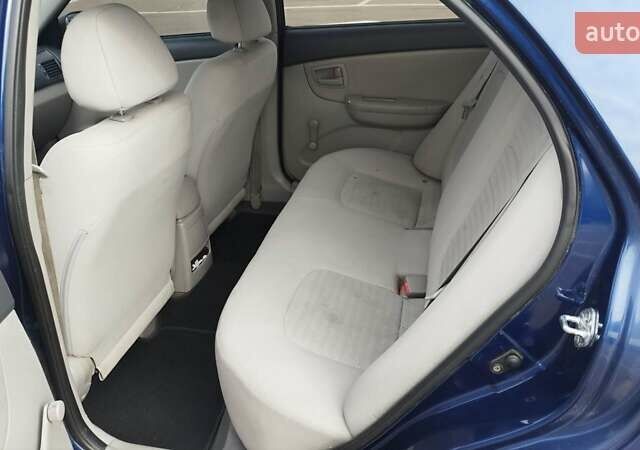 Синий Киа Черато, объемом двигателя 1.59 л и пробегом 253 тыс. км за 4700 $, фото 2 на Automoto.ua