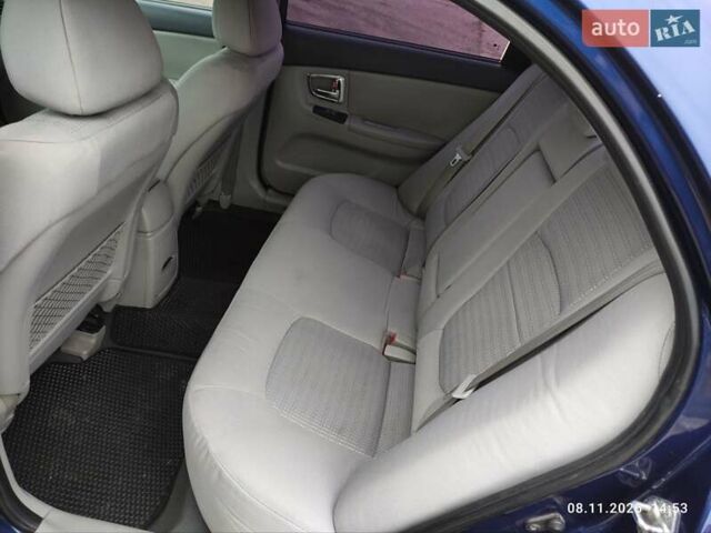 Синий Киа Черато, объемом двигателя 1.98 л и пробегом 246 тыс. км за 4400 $, фото 25 на Automoto.ua
