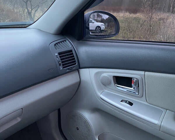 Синій Кіа Черато, об'ємом двигуна 1.59 л та пробігом 303 тис. км за 4400 $, фото 28 на Automoto.ua