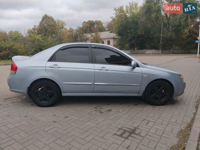 Синій Кіа Черато, об'ємом двигуна 1.6 л та пробігом 225 тис. км за 4900 $, фото 4 на Automoto.ua