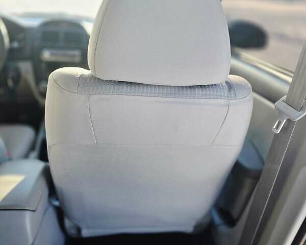 Синій Кіа Черато, об'ємом двигуна 1.6 л та пробігом 185 тис. км за 5450 $, фото 84 на Automoto.ua