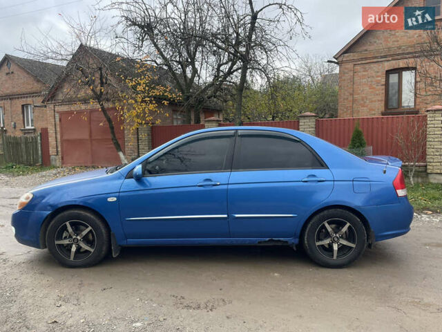 Синій Кіа Черато, об'ємом двигуна 2 л та пробігом 420 тис. км за 2500 $, фото 3 на Automoto.ua