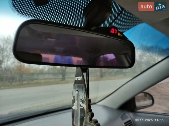 Синий Киа Черато, объемом двигателя 1.98 л и пробегом 246 тыс. км за 4400 $, фото 26 на Automoto.ua