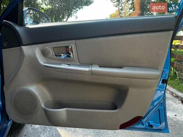 Синій Кіа Черато, об'ємом двигуна 1.6 л та пробігом 248 тис. км за 5990 $, фото 20 на Automoto.ua