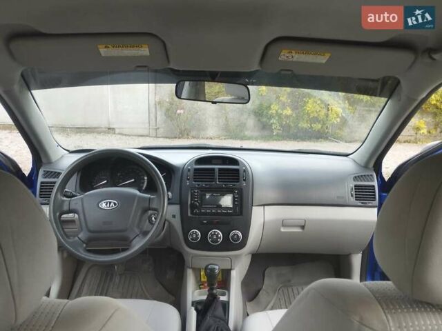 Синий Киа Черато, объемом двигателя 1.6 л и пробегом 297 тыс. км за 3900 $, фото 13 на Automoto.ua