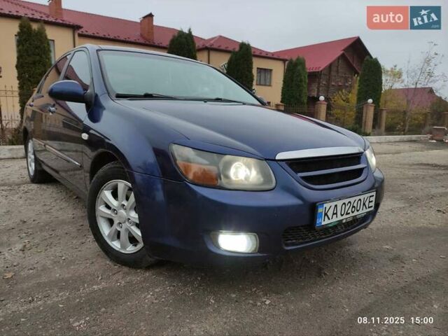 Синий Киа Черато, объемом двигателя 1.98 л и пробегом 246 тыс. км за 4400 $, фото 1 на Automoto.ua