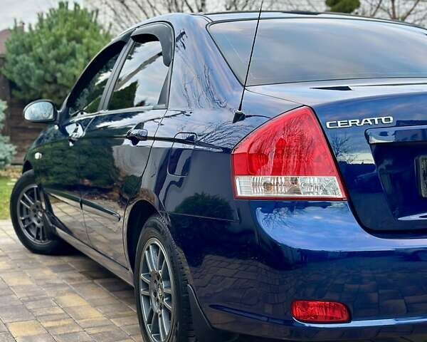 Синий Киа Черато, объемом двигателя 1.6 л и пробегом 125 тыс. км за 5750 $, фото 18 на Automoto.ua
