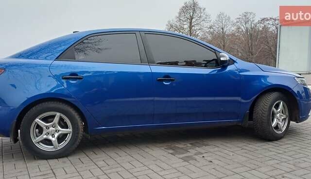 Синий Киа Черато, объемом двигателя 1.59 л и пробегом 240 тыс. км за 6450 $, фото 2 на Automoto.ua