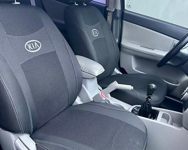 Синий Киа Черато, объемом двигателя 1.6 л и пробегом 125 тыс. км за 5750 $, фото 28 на Automoto.ua