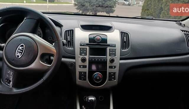 Синий Киа Черато, объемом двигателя 1.59 л и пробегом 240 тыс. км за 6450 $, фото 8 на Automoto.ua