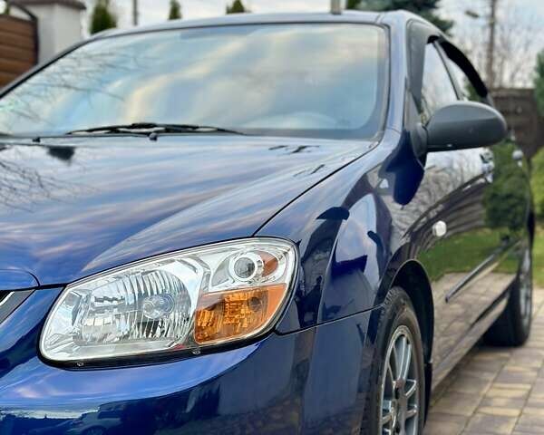 Синий Киа Черато, объемом двигателя 1.6 л и пробегом 125 тыс. км за 5750 $, фото 3 на Automoto.ua