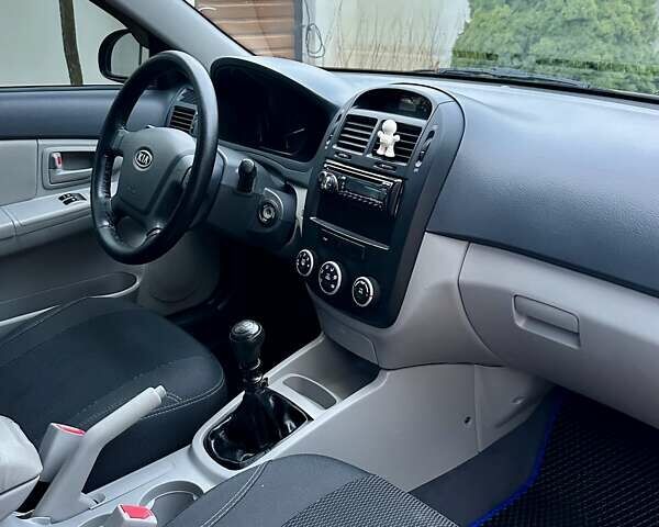 Синий Киа Черато, объемом двигателя 1.6 л и пробегом 125 тыс. км за 5750 $, фото 29 на Automoto.ua