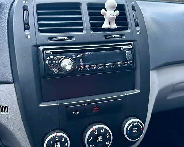 Синий Киа Черато, объемом двигателя 1.6 л и пробегом 125 тыс. км за 5750 $, фото 37 на Automoto.ua