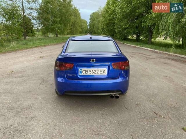 Синій Кіа Черато, об'ємом двигуна 2 л та пробігом 230 тис. км за 7350 $, фото 5 на Automoto.ua