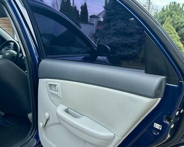 Синий Киа Черато, объемом двигателя 1.6 л и пробегом 125 тыс. км за 5750 $, фото 27 на Automoto.ua