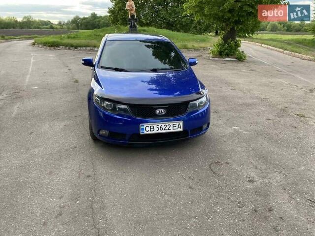 Синій Кіа Черато, об'ємом двигуна 2 л та пробігом 230 тис. км за 7350 $, фото 3 на Automoto.ua