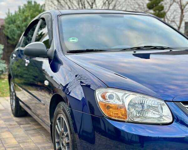 Синий Киа Черато, объемом двигателя 1.6 л и пробегом 125 тыс. км за 5750 $, фото 6 на Automoto.ua