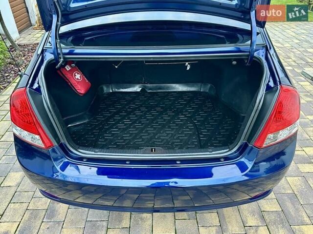 Синий Киа Черато, объемом двигателя 1.6 л и пробегом 125 тыс. км за 5750 $, фото 25 на Automoto.ua